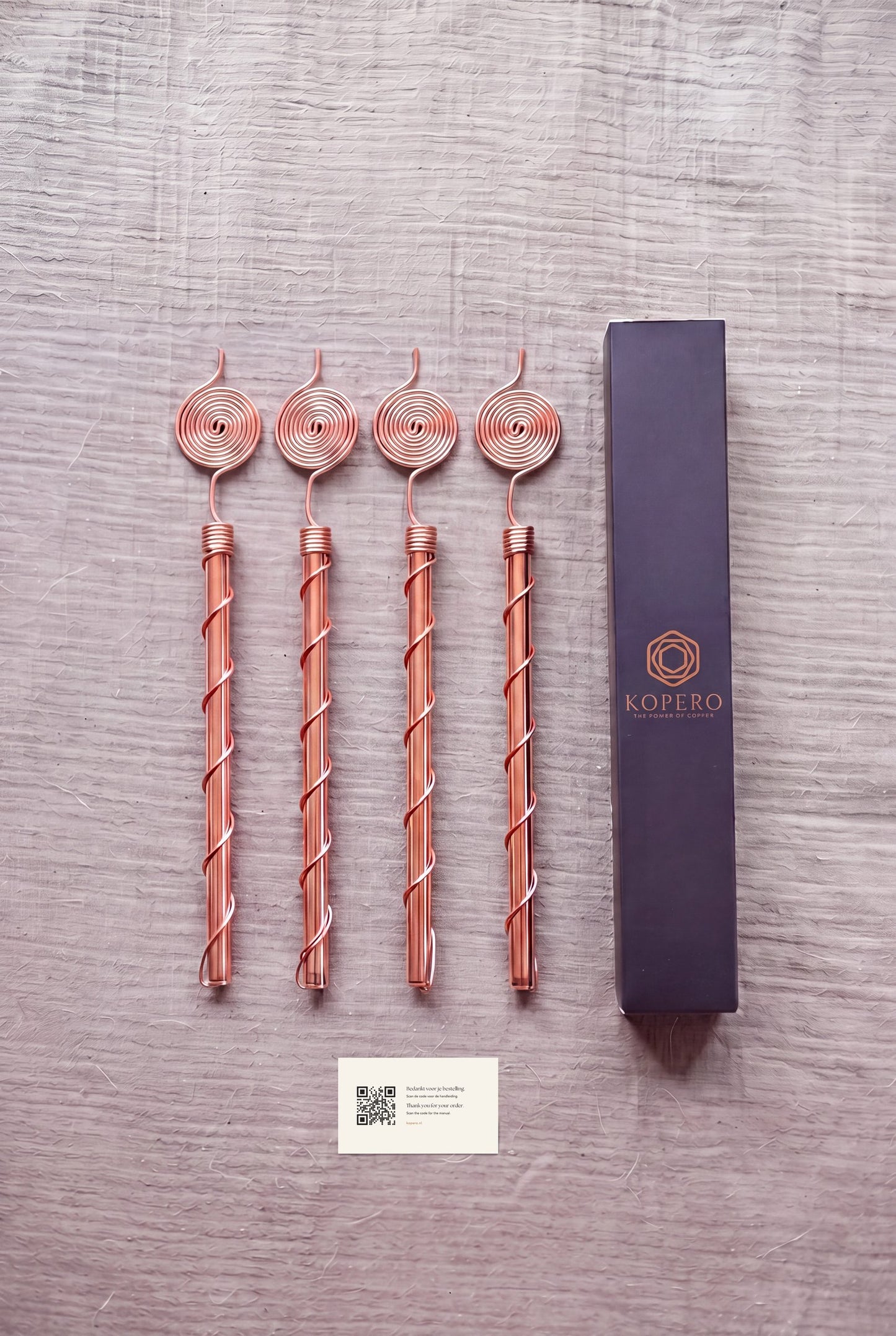 Quatre antennes d'électroculture en cuivre Kopero de 30 cm avec l'emballage et la carte de mode d'emploi